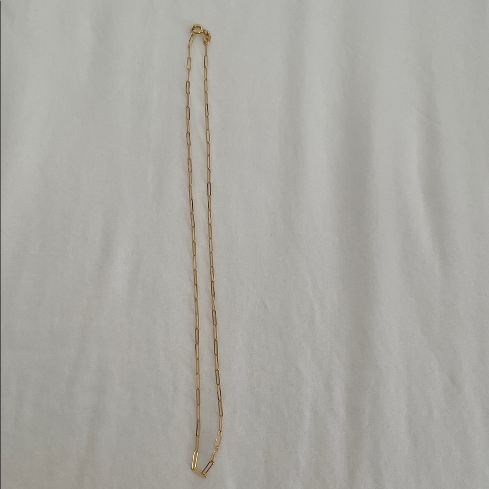 Paper clip necklace 14k yellow gold length is 14 inches